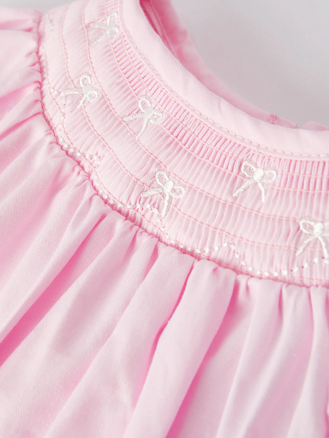 White Bow Smock Embroidered Pink Romper - Image 3