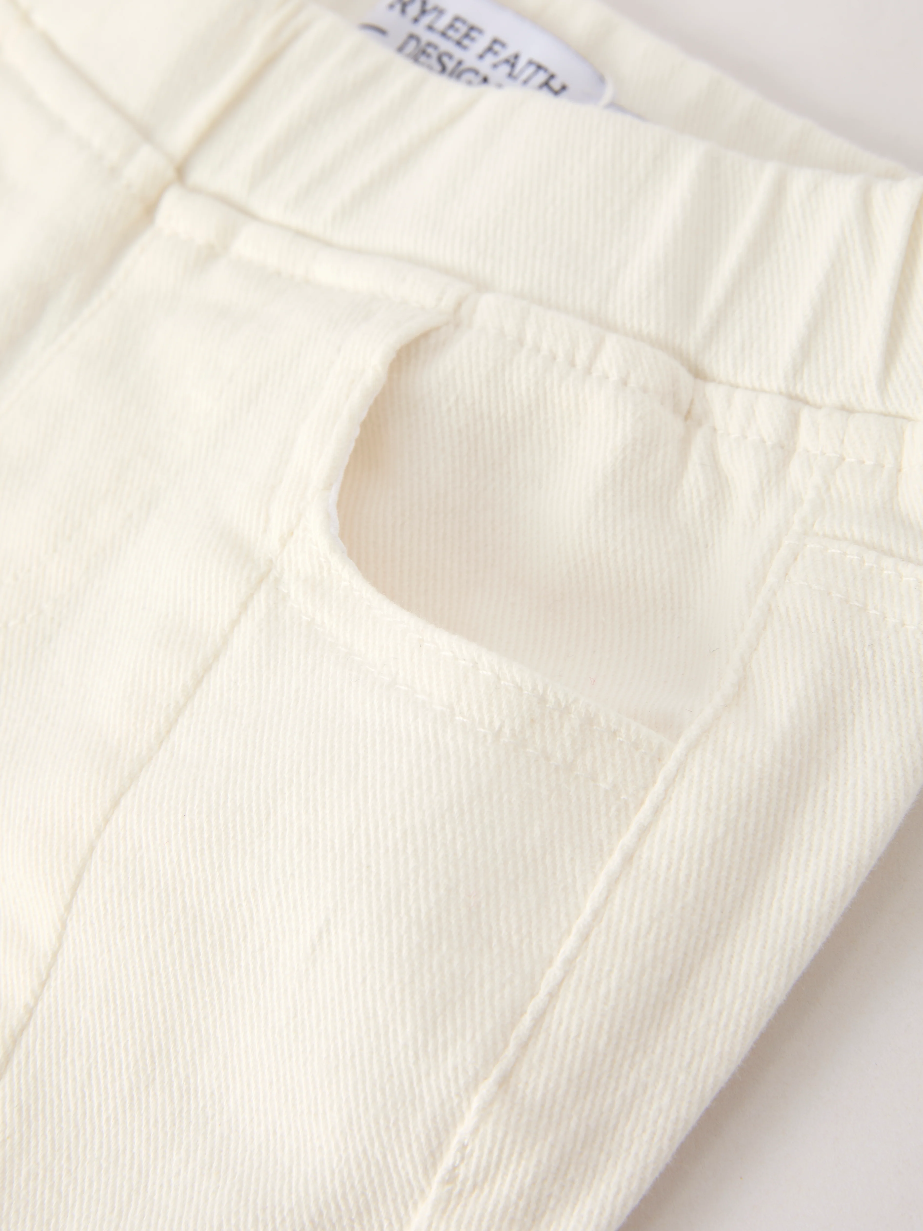 Charming White Denim Pants with Cute Bows - Image 3